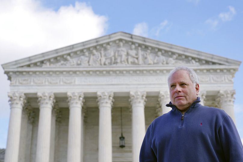 David Cassirer, the great-grandson of Lilly Cassirer Neubauer, poses for a photo outside the US Supreme Court.