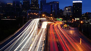 Vehicles move along Interstate 76 ahead in Philadelphia, Nov. 22, 2023. 