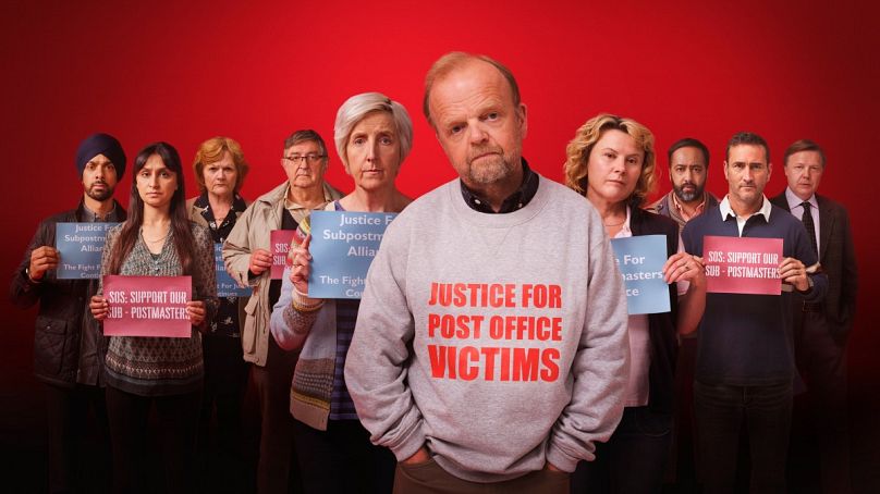 Cast members photographed in a poster for ITV's drama 'Mr Bates vs the Post Office'