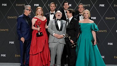 Alan Ruck, Sarah Snook, Alexander Skarsgard, Brian Cox, Nicholas Braun, Kieran Culkin, Matthew Macfayden, and J. Smith-Cameron, winners of best drama series for Succession