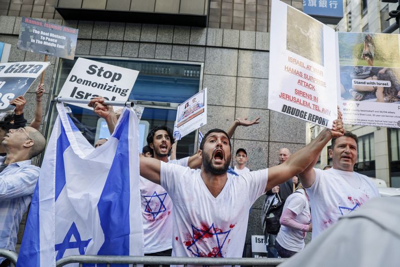 Hundreds Palestinian and Israeli supporters gather in opposing rallies outside of the Consulate of Israel in San Francisco on Sunday, Oct. 8, 2023.