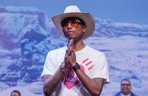 Pharrell Williams accepts applause after the Louis Vuitton Menswear ready-to-wear Fall-Winter 2024-2025 collection presented in Paris, Tuesday, Jan. 16, 2024.