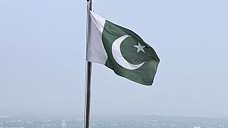 FILE - A Pakistani flag flies on a lookout in Islamabad, Pakistan, on July 27, 2022. Pakistan's air force launched retaliatory airstrikes early Thursday, Jan. 18, 2024