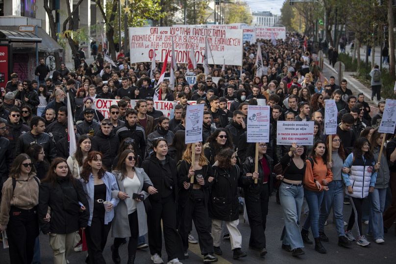 Protesters march during a demonstration in central Athens, Greece, on Thursday, Jan. 18, 2024.