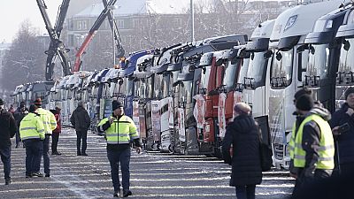 Hauliers in Munich protest against increased German fuel duty on 12 January. Six days later the EU has decided diesel trucks must be phased out almost entirely.