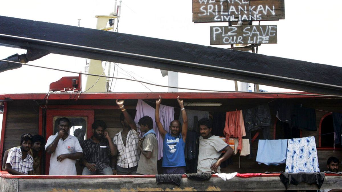 Srí Lanka-i menekültek egy indonéziai kikötőben 2009. október 14-én (a kép illusztráció)