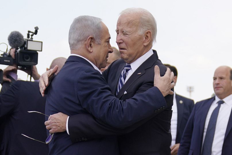 President Joe Biden is greeted by Israeli Prime Minister Benjamin Netanyahu after arriving at Ben Gurion International Airport in Tel Aviv in October