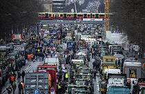 Farmers with tractors arrive for a protest at the government district in Berlin, Germany, Monday, Jan 15, 2024. 
