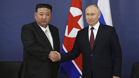 Russian President Vladimir Putin and North Korea's leader Kim Jong Un shake hands during their meeting at the Vostochny cosmodrome outside the city of Tsiolkovsky, Russia 