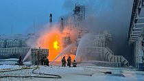 Fire fighters extinguish the blaze at Russia's second-largest natural gas producer, Novatek in Ust-Luga, 165 kilometres southwest of St. Petersburg, Russia on Sunday