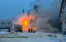 Fire fighters extinguish the blaze at Russia's second-largest natural gas producer, Novatek in Ust-Luga, 165 kilometres southwest of St. Petersburg, Russia on Sunday