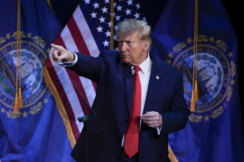 Republican presidential candidate former President Donald Trump pointing to members of the audience during a campaign event in Rochester, N.H., Sunday, Jan. 21, 2024.