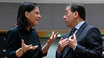 Germany's foreign minsiter Annalena Baerbock (left) and Spain's foreign minister José Manuel Albares Bueno (right) speak ahead of the Foreign Affairs Council, Brussels, 21 Jan