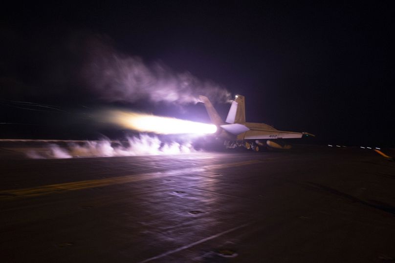 U.S. Navy shows an aircraft launching from USS Dwight D. Eisenhower (CVN 69) during flight operations in the Red Sea, Jan. 22, 2024.