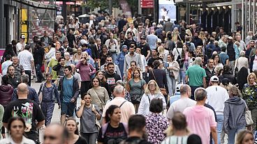 People walking the main shopping street in Dortmund, Germany, on Sept. 28, 2023.