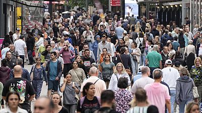 People walking the main shopping street in Dortmund, Germany, on Sept. 28, 2023.