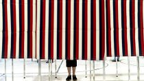 Un isoloir dans un bureau de vote de Manchester, New Hampshire, aux États-Unis, mardi 23 janvier 2024.