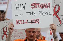 Protesters demand more support for AIDS victims at a protest in Vienna, Austria, in July 2010.