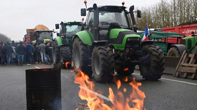Farmers block a highway during a demonstration Tuesday, Jan. 23, 2024 near Beauvais, northern France.