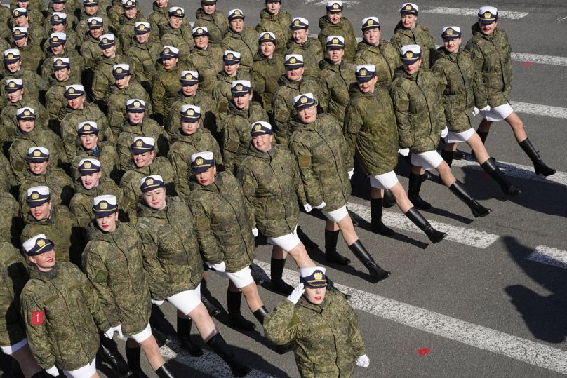 Navy servicewomen march during a rehearsal for the Victory Day military parade, Thursday 4 May, 2023.