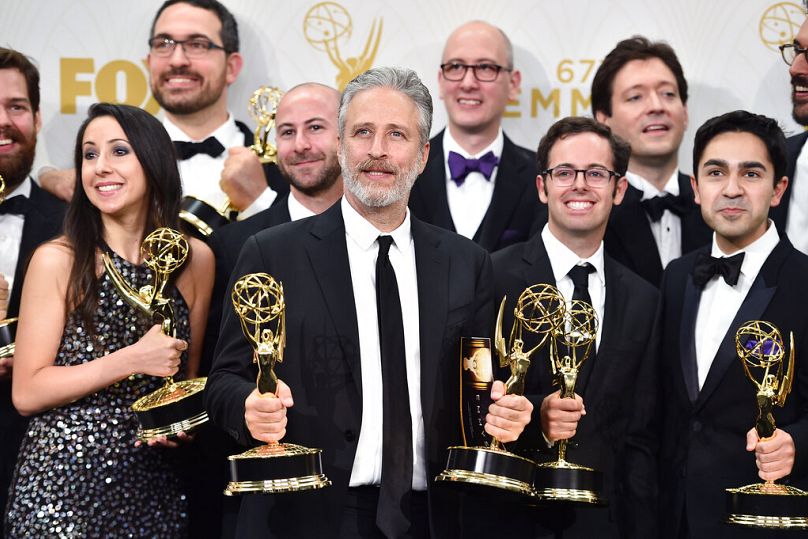 Jon Stewart with cast and crew to collect Emmy award for outstanding variety talk series for "The Daily Show with Jon Stewart" in 2015.