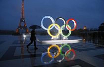 A display of the Olympic rings is set up on Trocadero plaza that overlooks the Eiffel Tower
