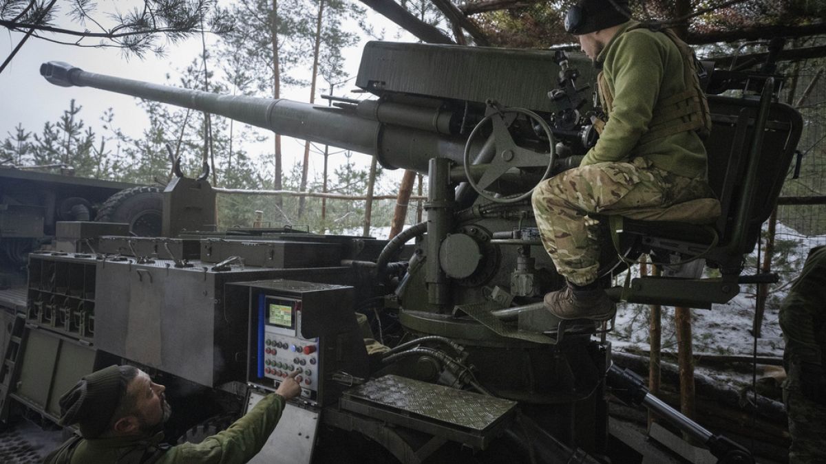 Ukrainian servicemen fire a self-propelled howitzer "Bohdana" towards Russian positions near Bakhmut, Ukraine, Donetsk region, Ukraine, Friday, Jan. 26, 2024.