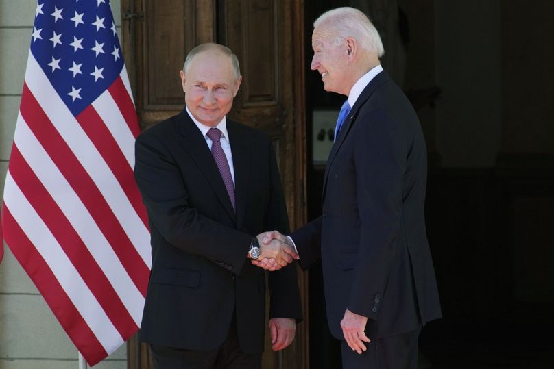 Russian President Vladimir Putin, left, and US President Joe Biden shake hands during their meeting at the 'Villa la Grange' in Geneva, Switzerland in 2021