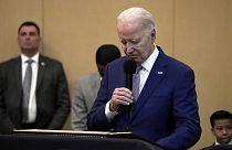President Joe Biden bows his head in a moment of silence for the three American troops killed Sunday, Jan. 28, 2024
