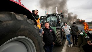 Farmers block a highway Tuesday, Jan. 30, 2024 in Jossigny, east of Paris. 