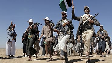 Houthi fighters march during a rally of support for the Palestinians in the Gaza Strip and against the U.S. strikes on Yemen outside Sanaa on Jan. 22, 2024. 