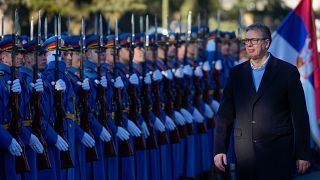 Serbia's President Aleksandar Vučić reviews the honour guard during a welcoming ceremony at the army barracks in Belgrade.