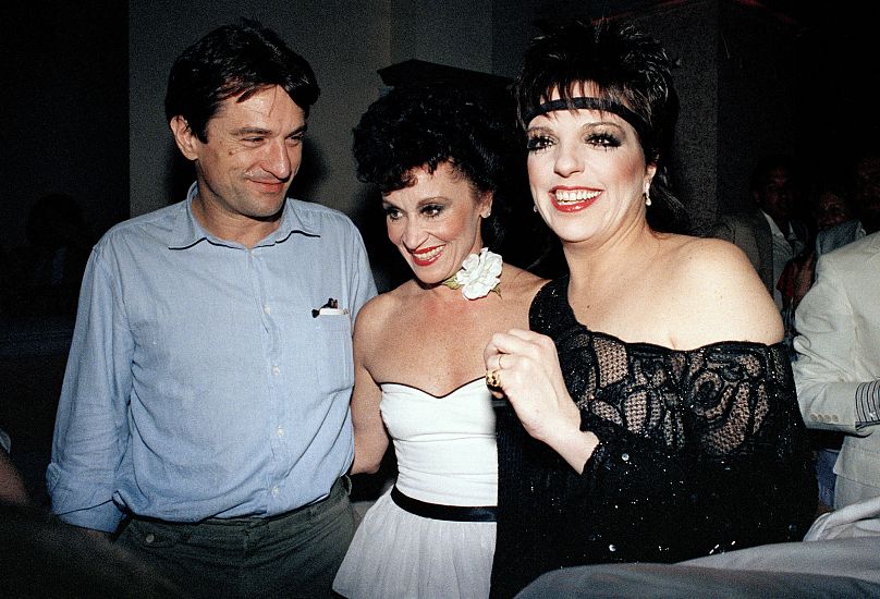 Liza Minnelli, right, is shown with Chita Rivera and actor Robert De Niro, during a party to honour Rivera for winning the best actress Tony Award - 1984