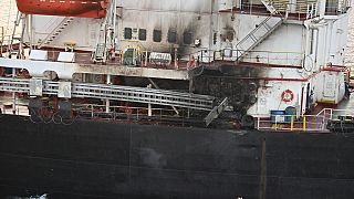 This photograph provided by the Indian Navy shows U.S.-owned ship Genco Picardy that came under attack Wednesday from a bomb-carrying drone launched by Yemen's Houthi rebels