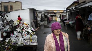 An ethnic Hungarian woman leaves the market in downtown Berehevo on Saturday