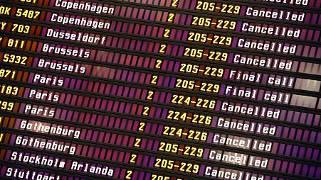 FILE: Cancelled flights are seen on the departures board at Helsinki-Vantaa Airport, in Vantaa, Finland, Thursday Oct. 19, 2006.