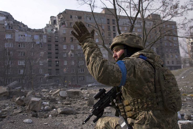 A Ukrainian serviceman guards his position in Mariupol, March 2022