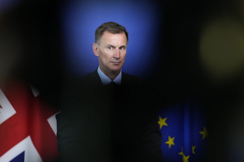 Chancellor of the Exchequer of the United Kingdom Jeremy Hunt listens to questions during a media conference at EU headquarters in Brussels, May 2023