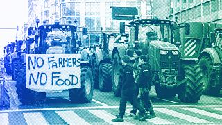 Tractors are parked near the European Parliament during a protest by farmers as European leaders meet for an EU summit in Brussels, February 2024
