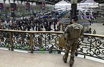 A soldier patrols inside the Gare de Lyon station after an attack, Saturday, Feb. 3, 2024 in Paris. 