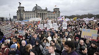 People protest in front of Germany's parliament 