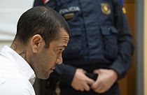 Brazilian soccer star Dani Alves sits during his trial in Barcelona, Spain, Monday, Feb. 5, 2024