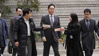 Samsung Electronics Chairman Lee Jae-yong, center, arrives at the Seoul Central District Court in Seoul, South Korea. Feb. 5, 2024. 