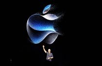 Apple CEO Tim Cook waves at an announcement of new products on Sept. 12, 2023, in Cupertino, Calif. 