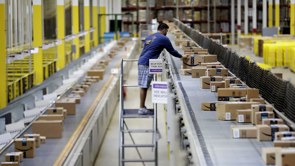 A worker in a Amazon warehouse.