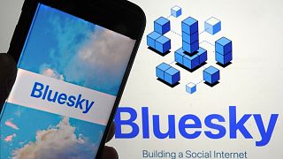 The app for Bluesky is shown on a mobile phone, left, and on a laptop screen, Friday, June 2, 2023, in New York.