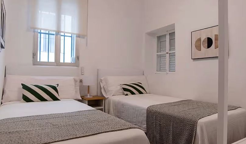 A simple, but comfortable, bedroom at the Convent of Saint Mary of Jesus Airbnb
