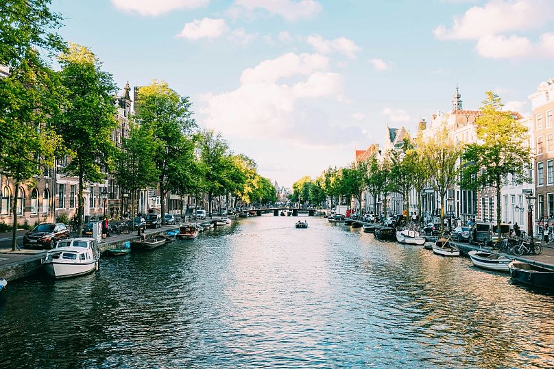 Take a romantic solo stroll along Amsterdam's iconic canals