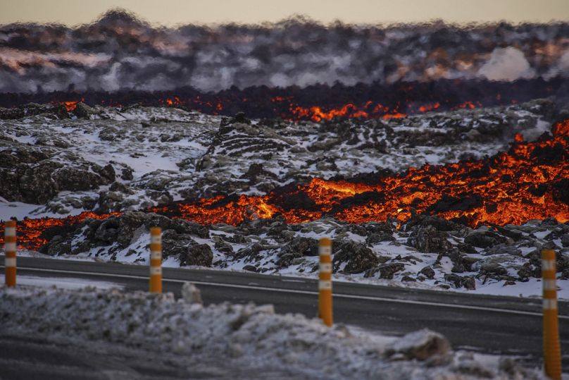 A view of lava near to the road to Grindavík, close to the exit for the Blue Lagoon, in Grindavík, Iceland, Thursday, Feb. 8