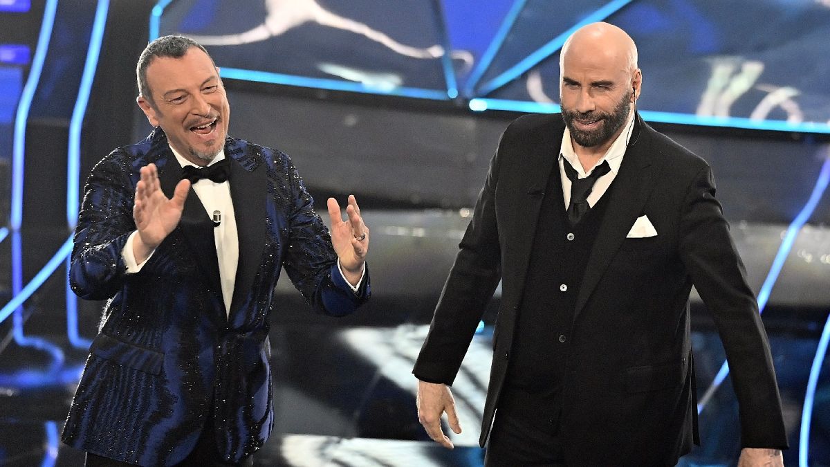 John Travolta’s bizarre duck-dance stuns Sanremo crowd and gets pulled from Italian TV thumbnail